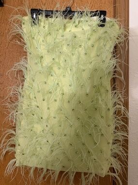 Lime green feather mini dress